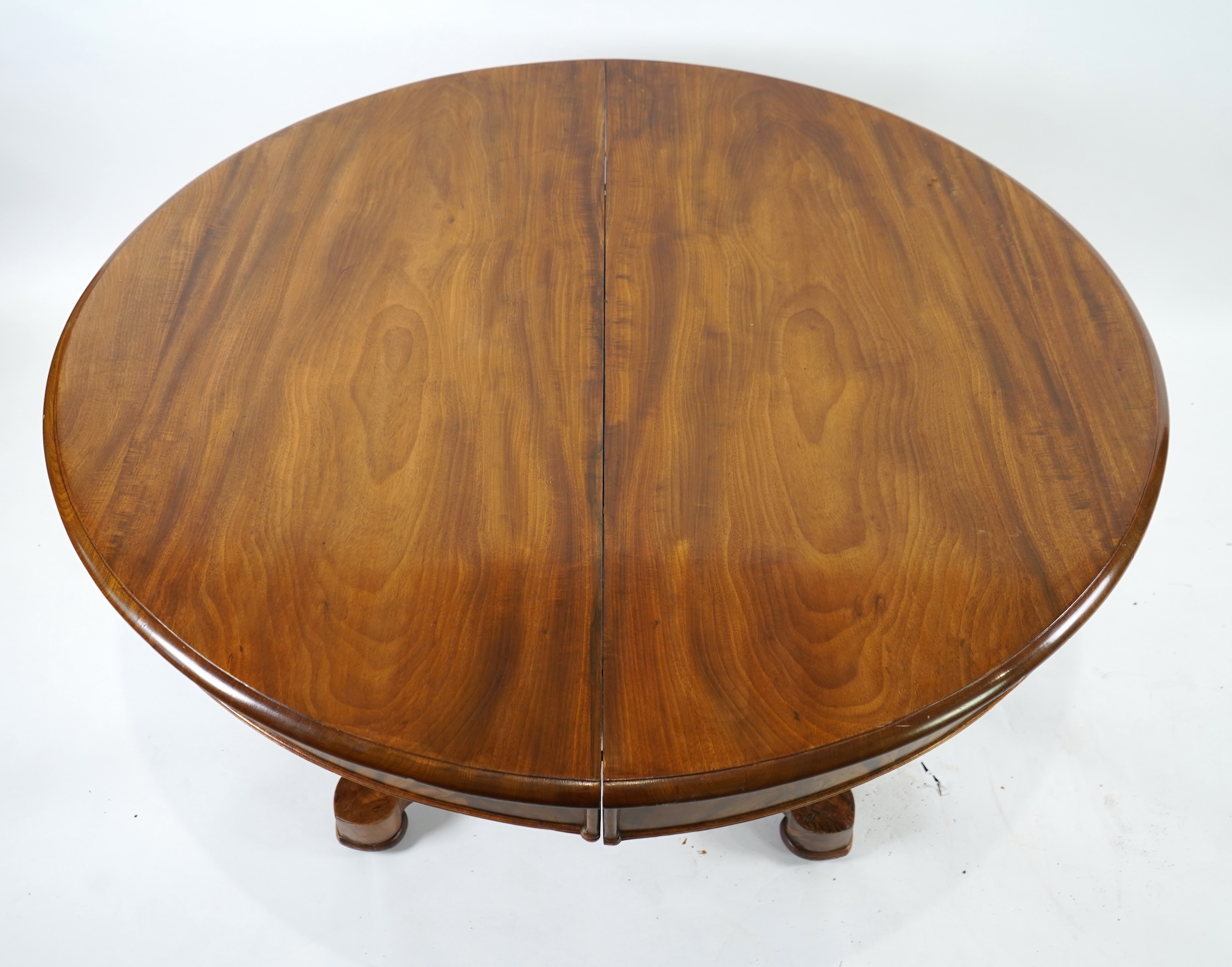 A mid 19th century Continental mahogany extending dining table